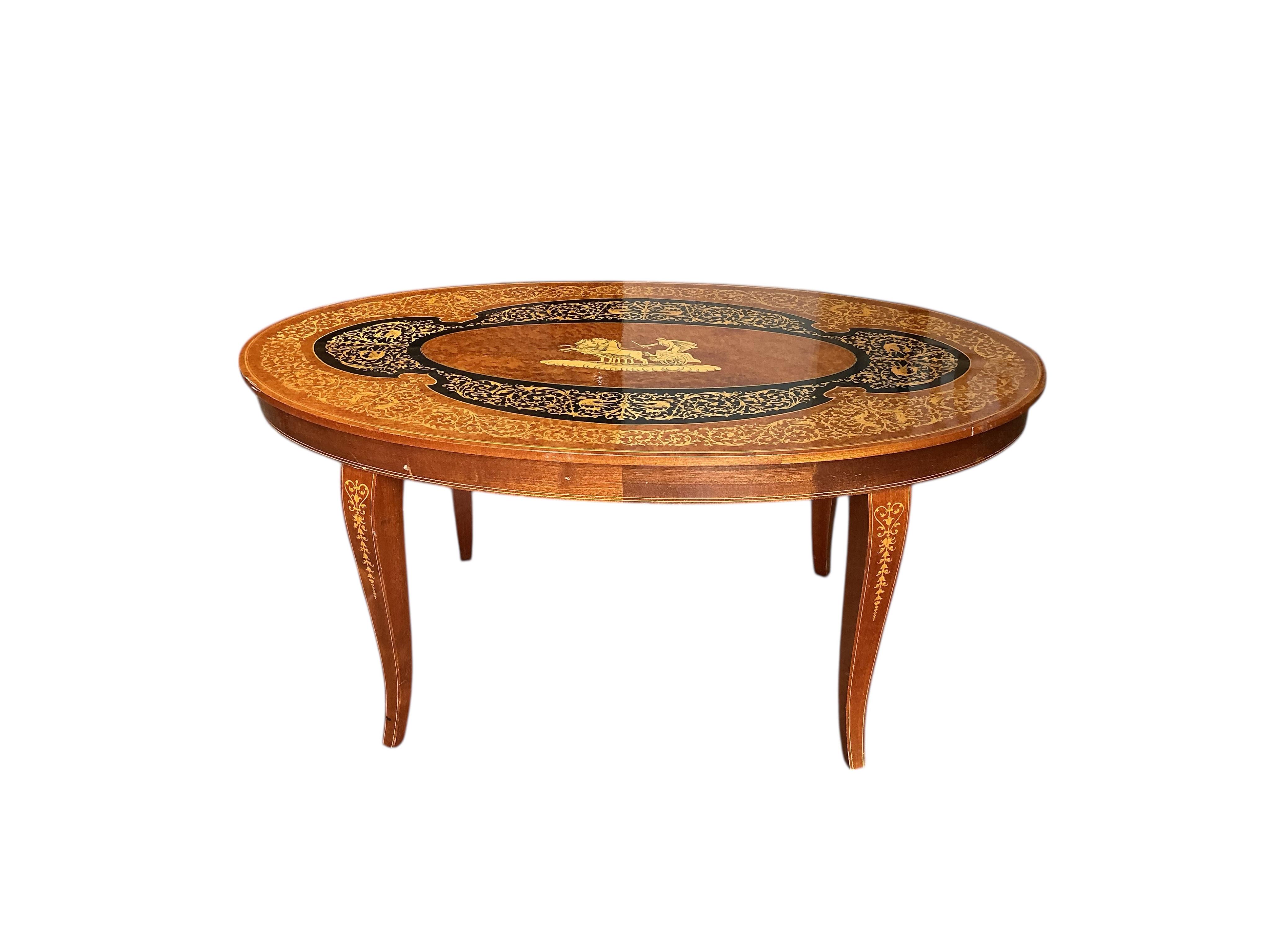 A Sorrento marquetry oval bird's eye maple coffee table, width 99cm, depth 58cm, height 47cm